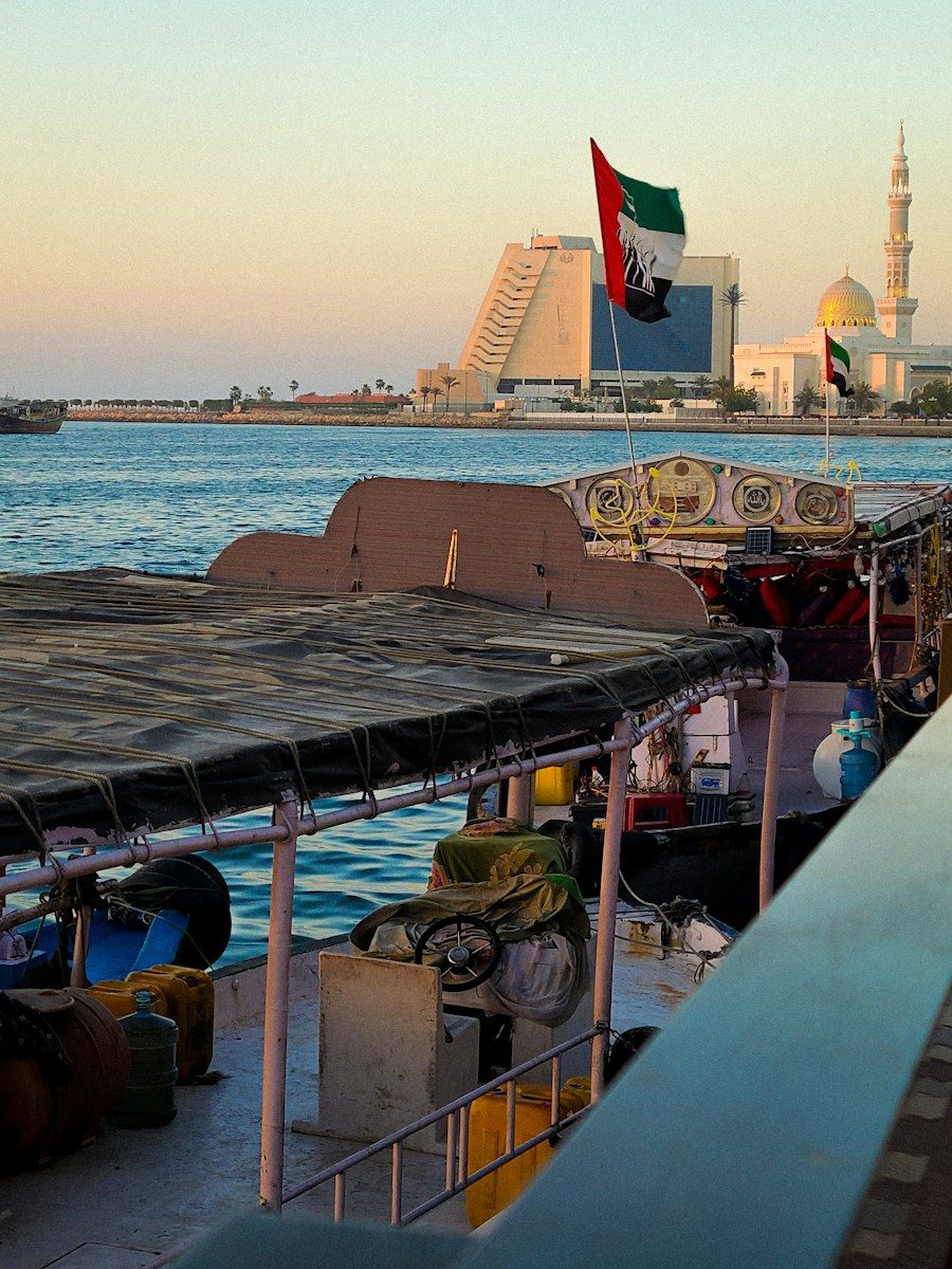 Boats docked by a waterfront in the united arab emirates